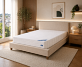 Matelas Sensospring 140x200 cm Oli posé sur un lit 2 personne dans une chambre moderne – confort équilibré à ressorts ensachés